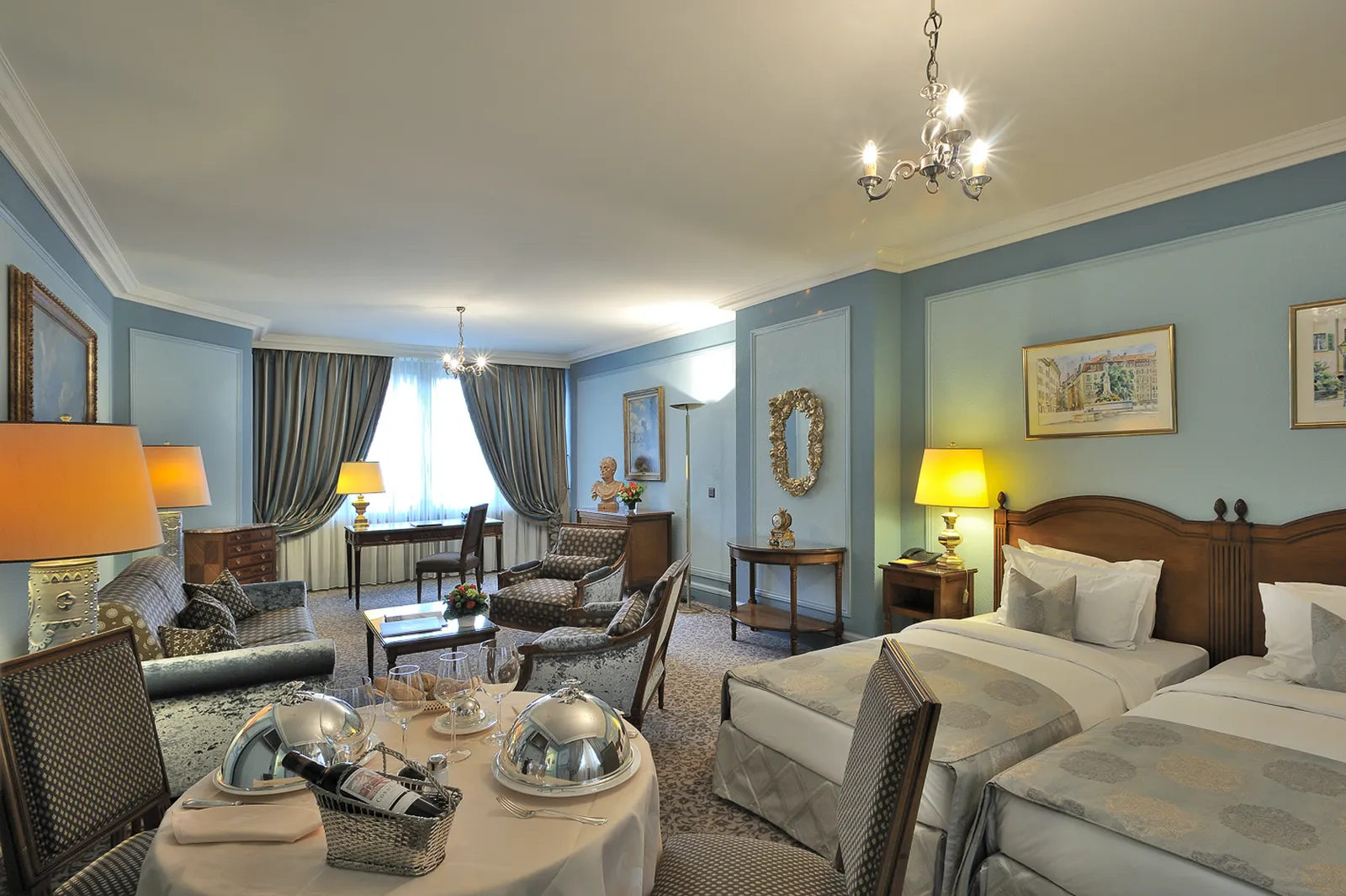 A twin room with a breakfast table
