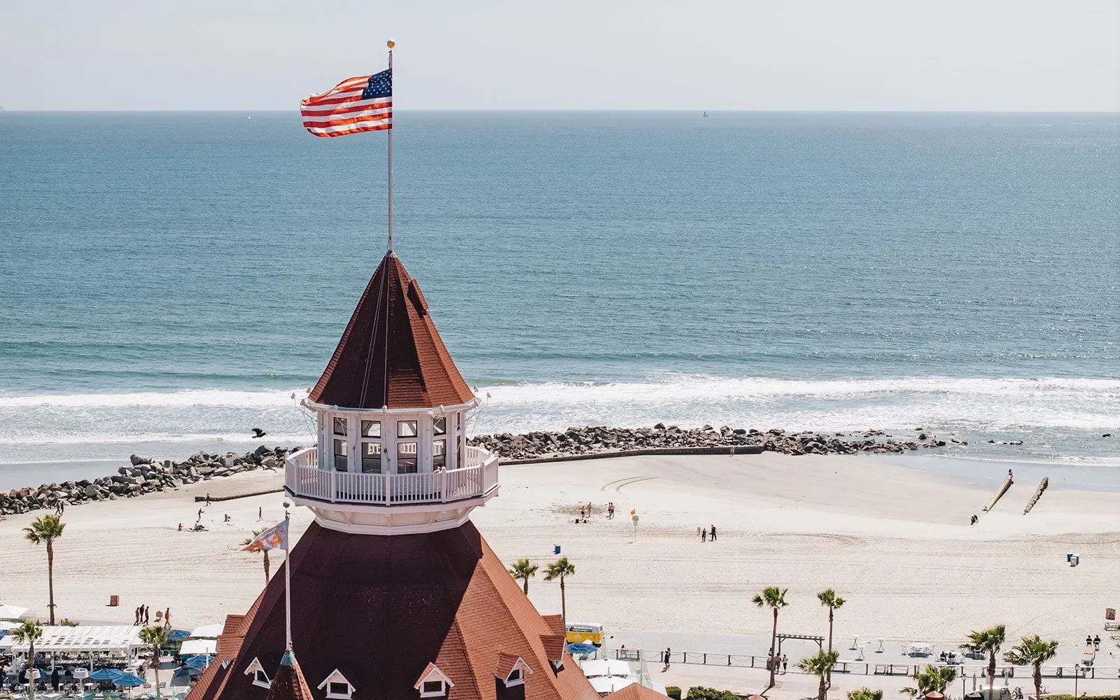A Victorian turret, the American flag and the ocean beyond