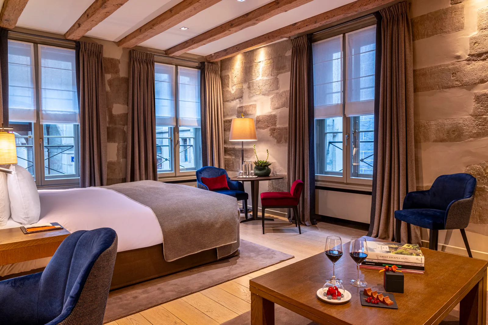 A Junior Suite with its bed and sitting area