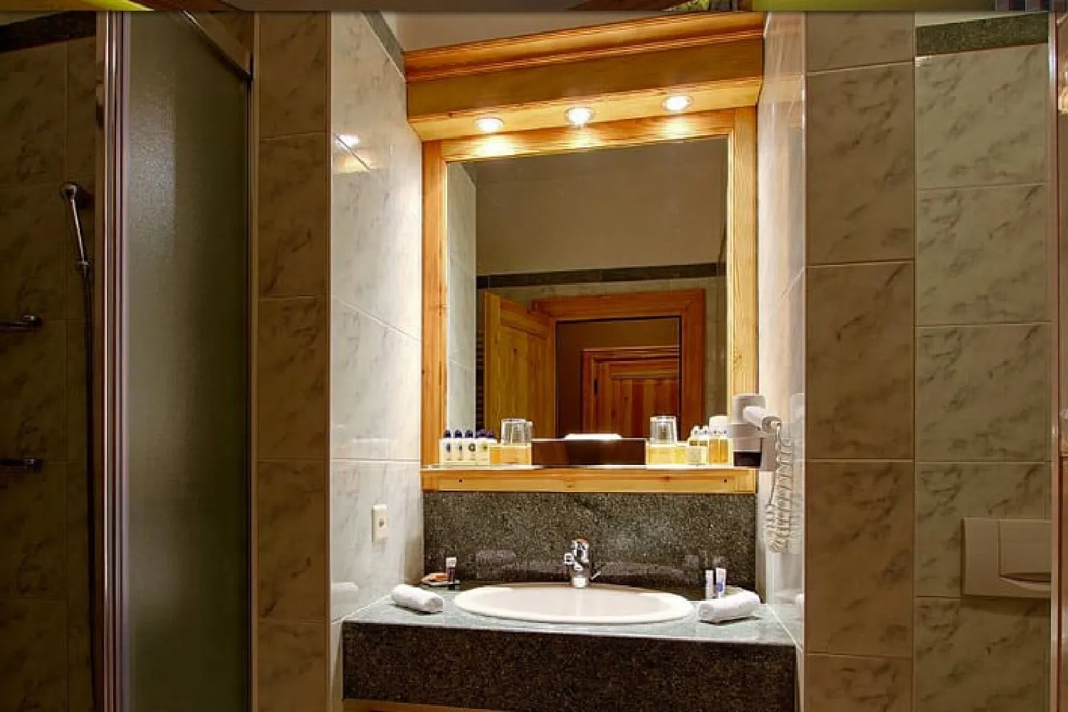 The basin is set into the dark counter.