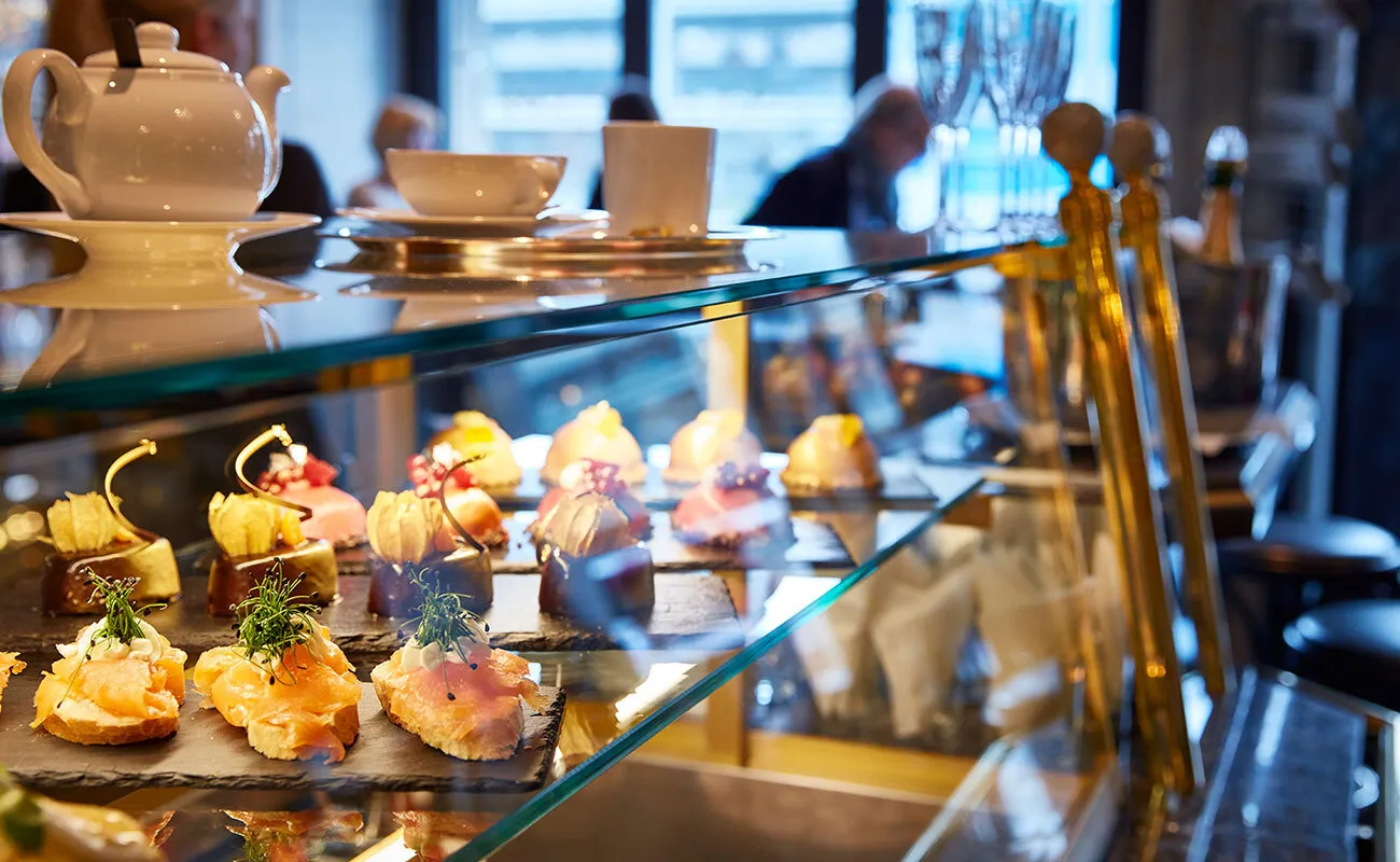 Pastries and a teapot at Café Gourmet