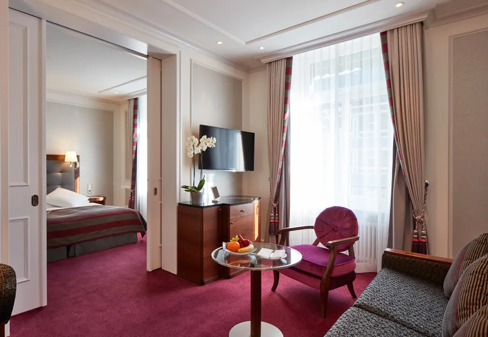 Doors between the bedroom and sitting room in a Dufour Junior Suite