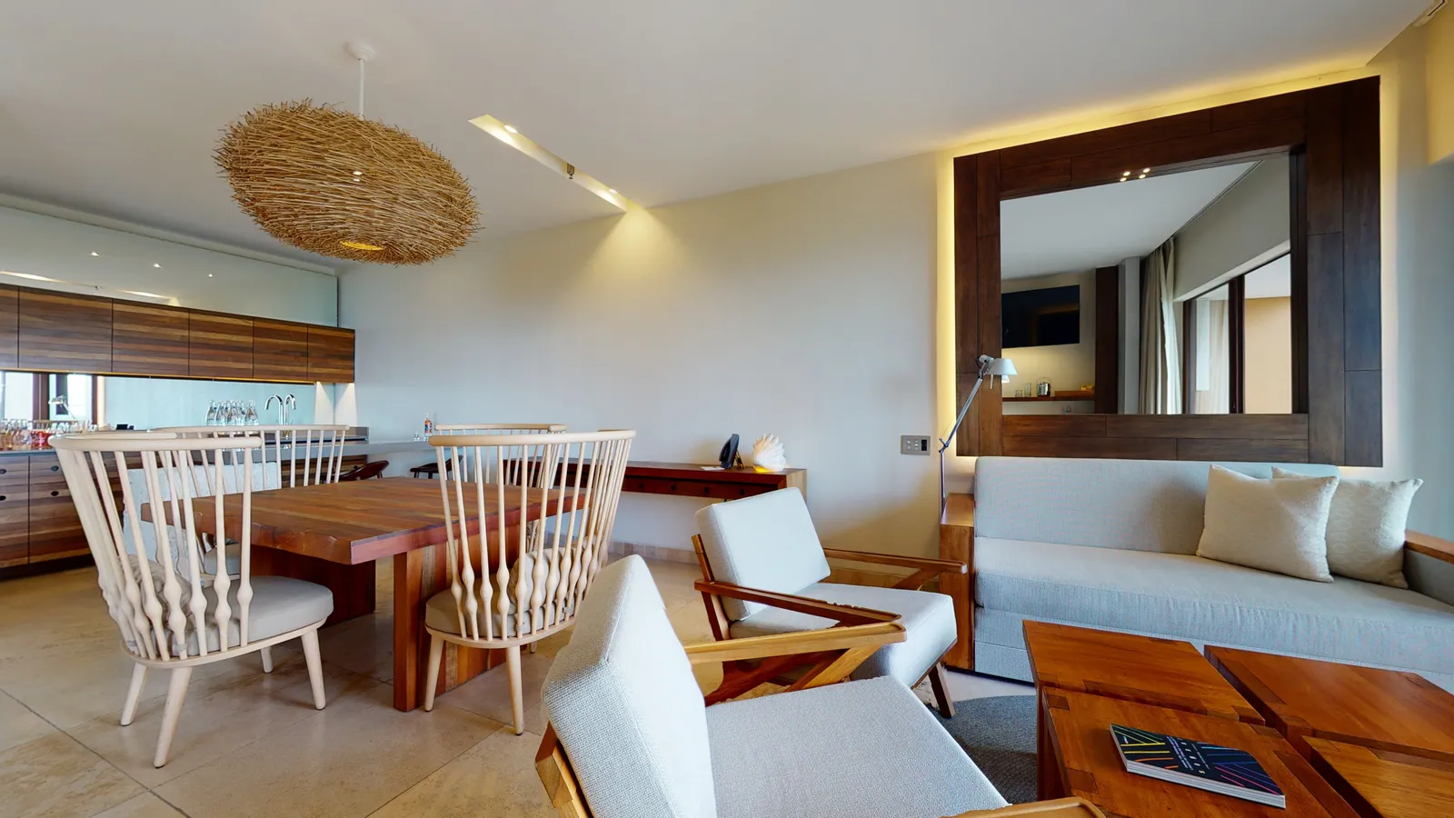Adults Junior Suite living area with dining table and sofa