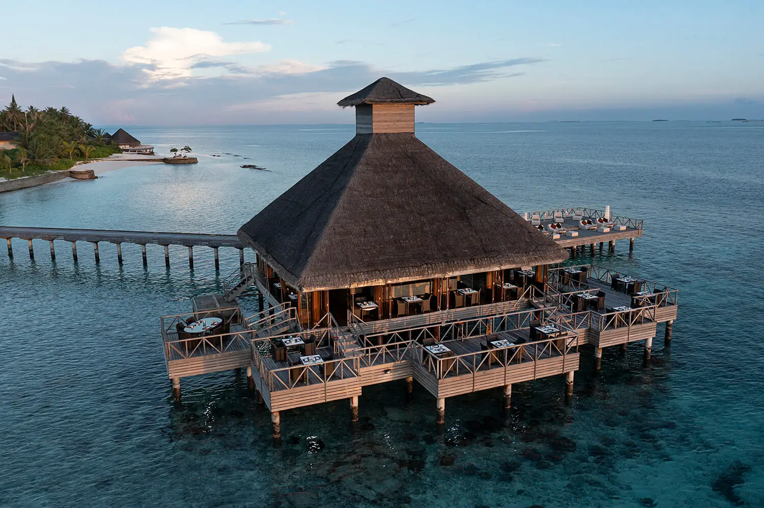 Salt restaurant on its stilts, from above at sunset