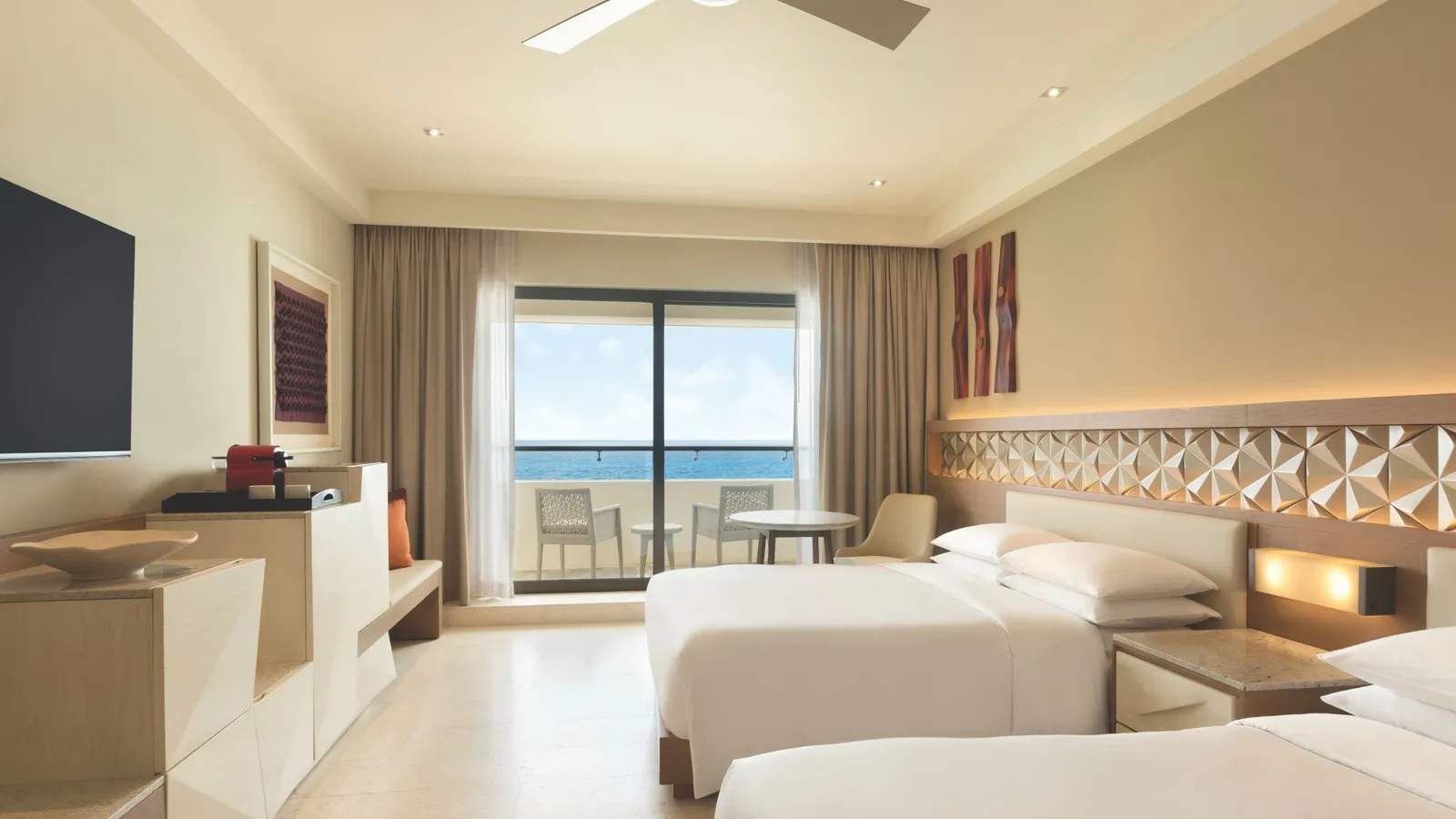 2 beds and an oceanfront balcony