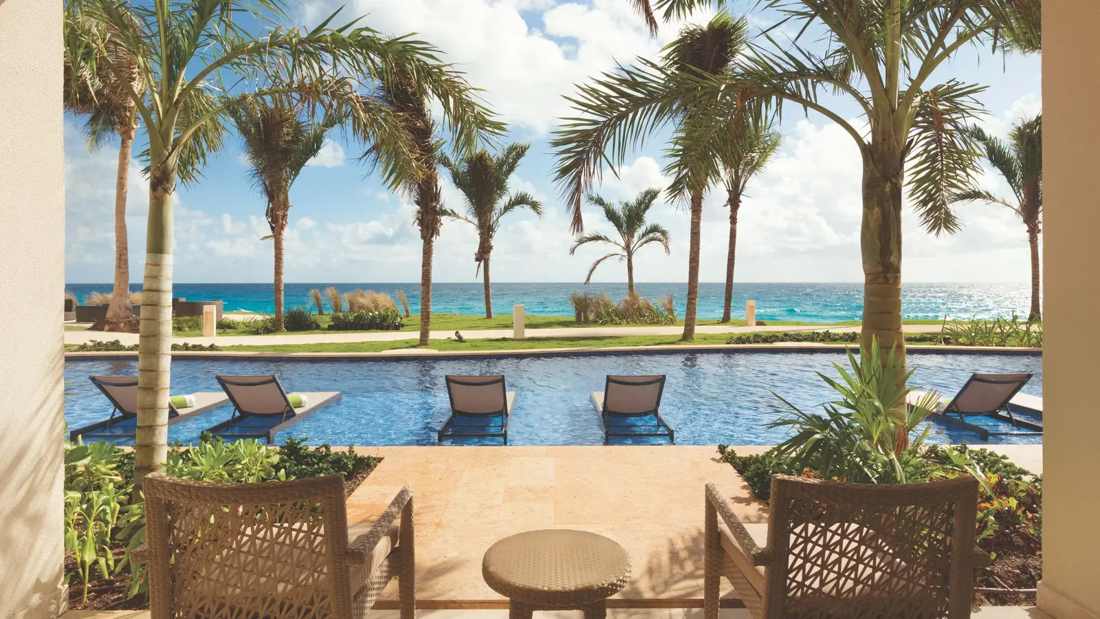 A terrace with loungers and semi-private pool access