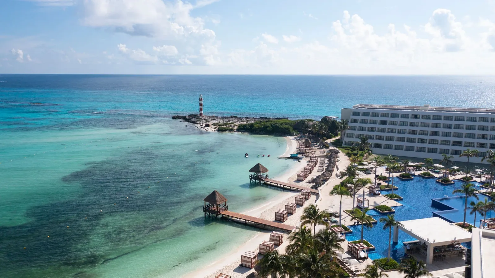 The curved beach beside Hyatt Ziva Cancun’s pools