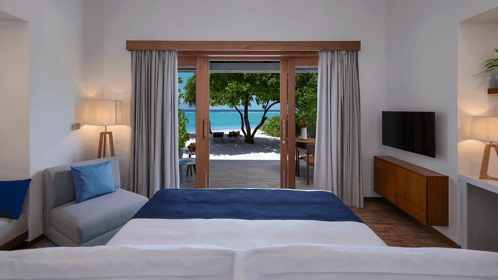 The bedroom looking towards the beach.