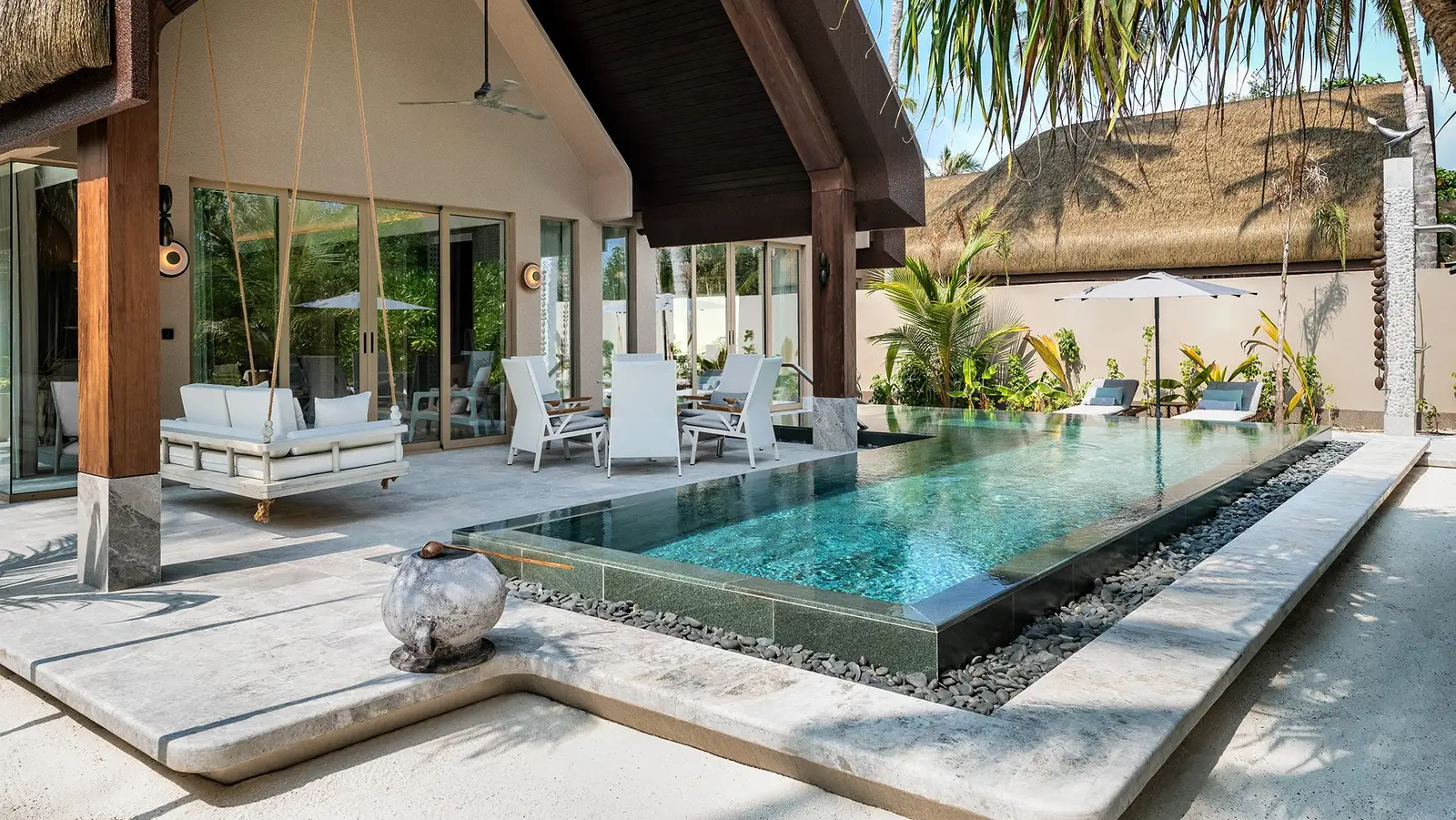 A Two Bedroom Beach Pool Villa’s pool beside the house