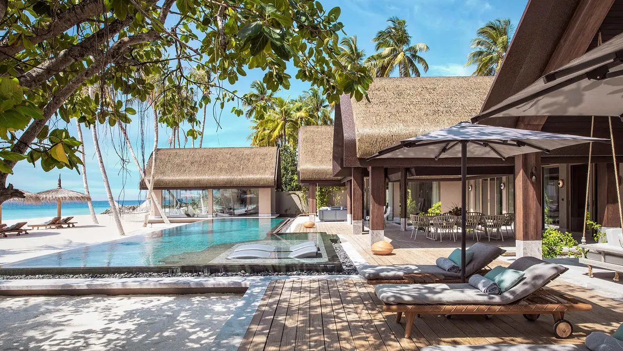 The Three Bedroom Wellbeing Beach Pool Residence’s pool by the beach