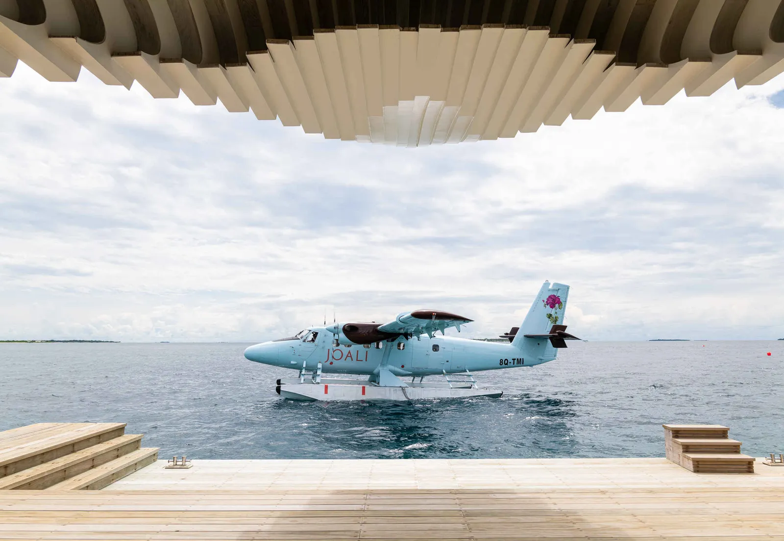 The seaplane moored at the arrival jetty