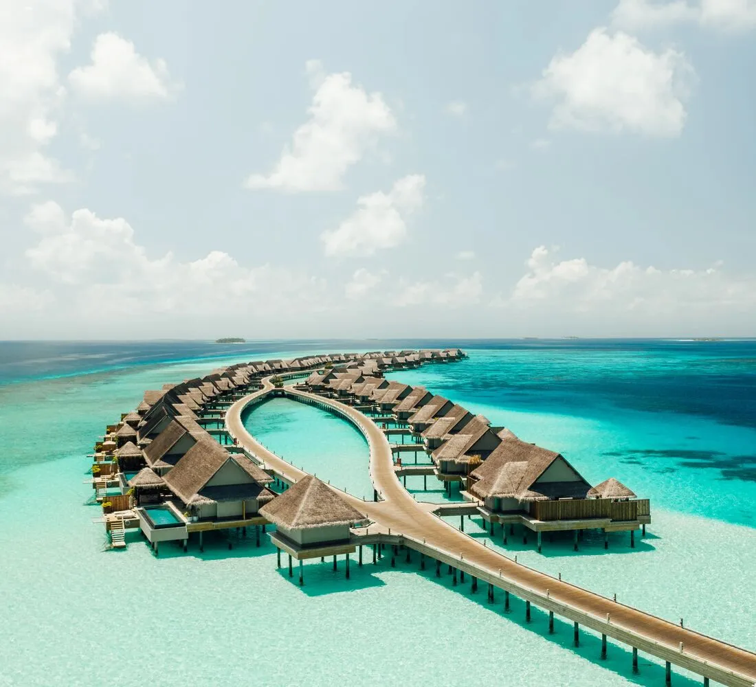 The water villas from the air, above the lagoon