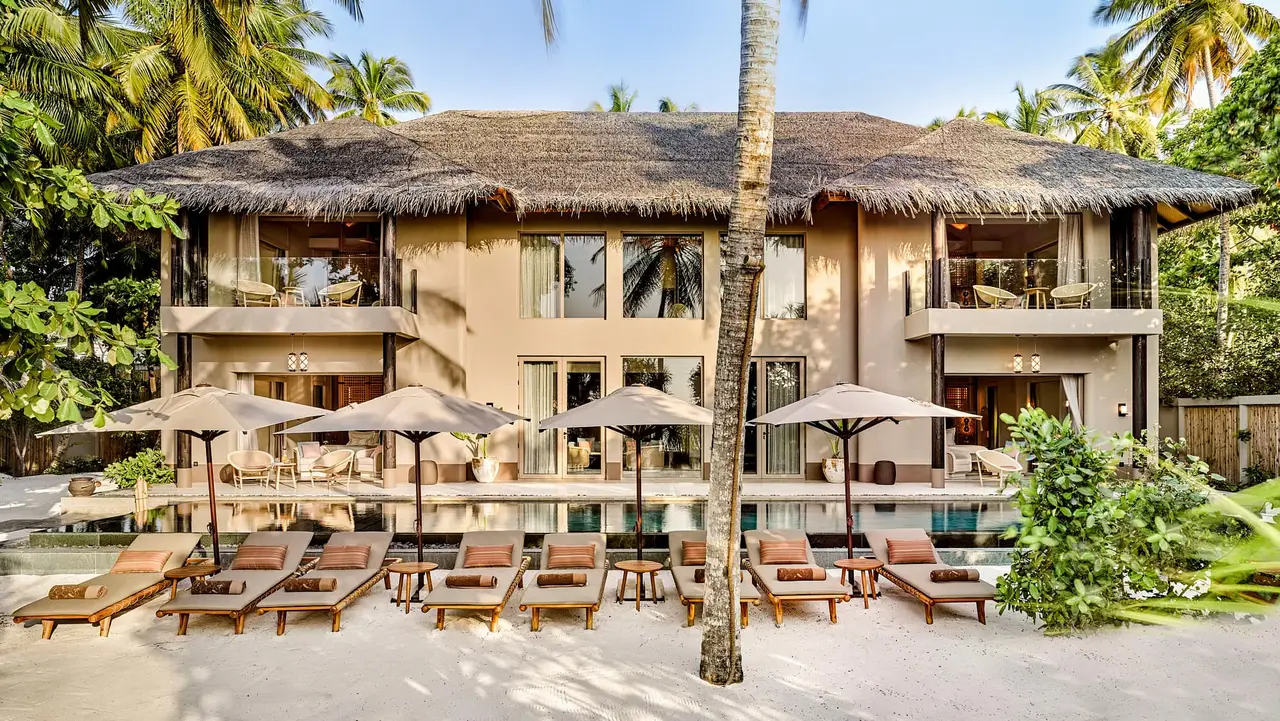 The 2-storey Four Bedroom Beach Residence, its pool in front