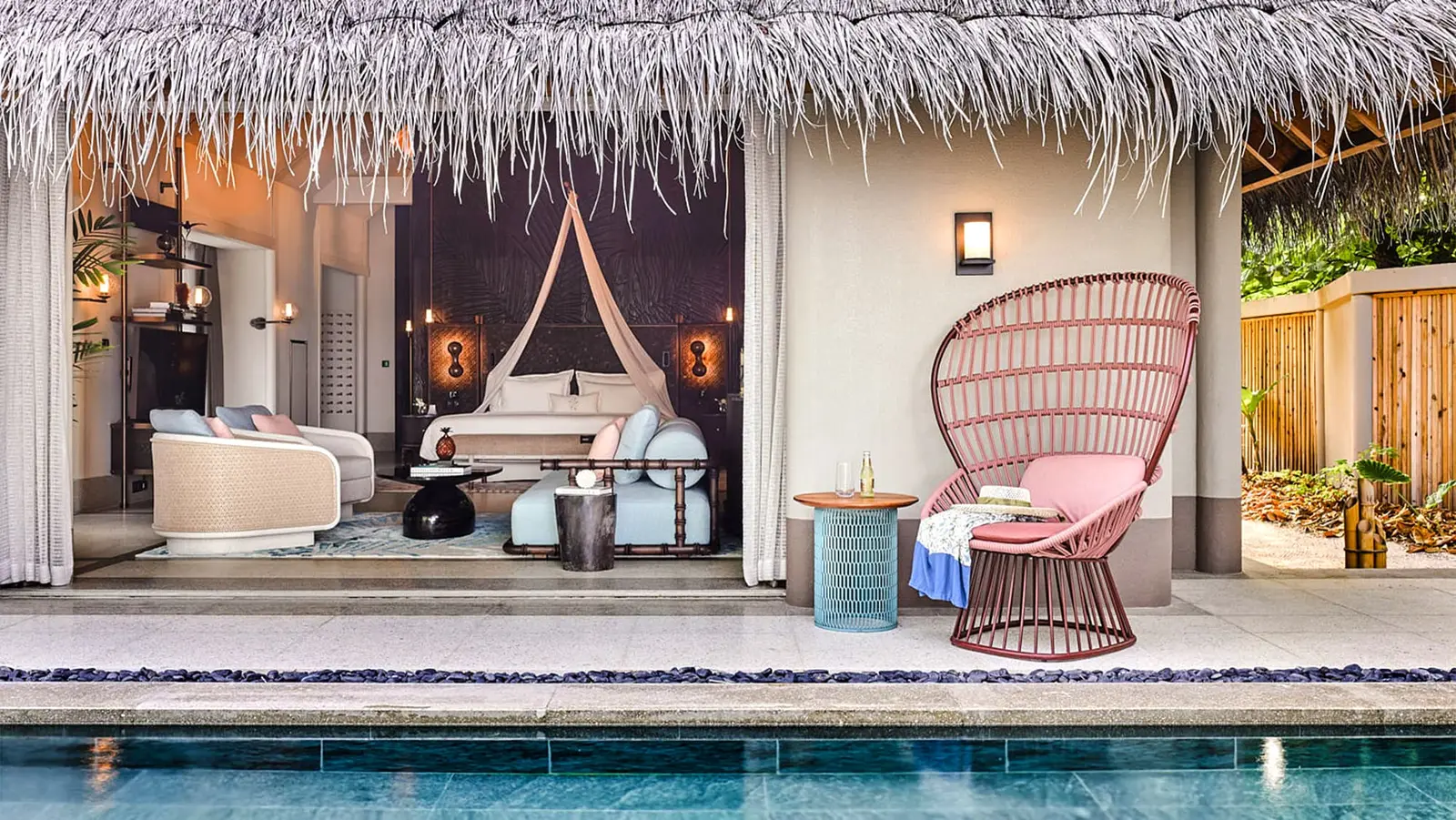 A Beach Villa with Pool’s bedroom, open to the pool