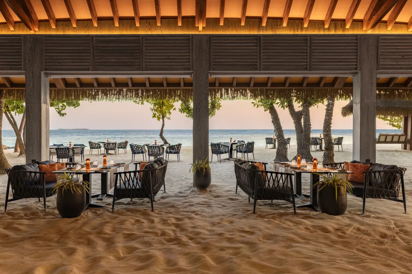 TUH’U’s dining room, tables facing the beach
