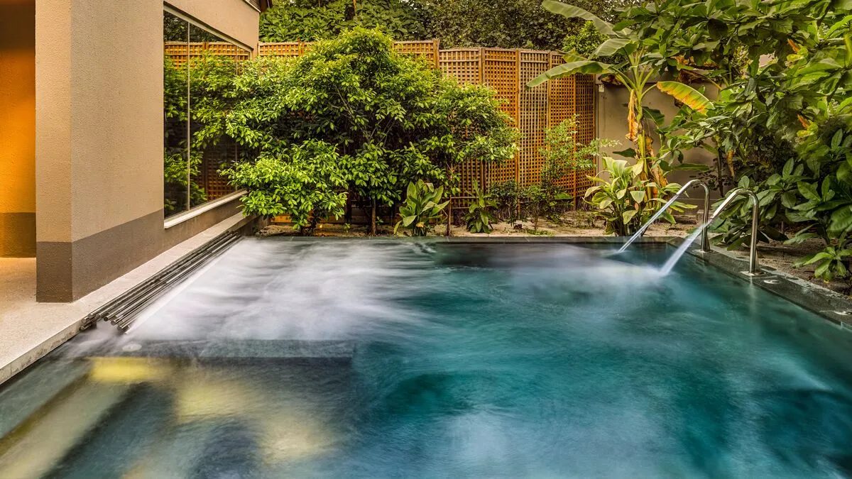 The spa’s vitality pool among the plants