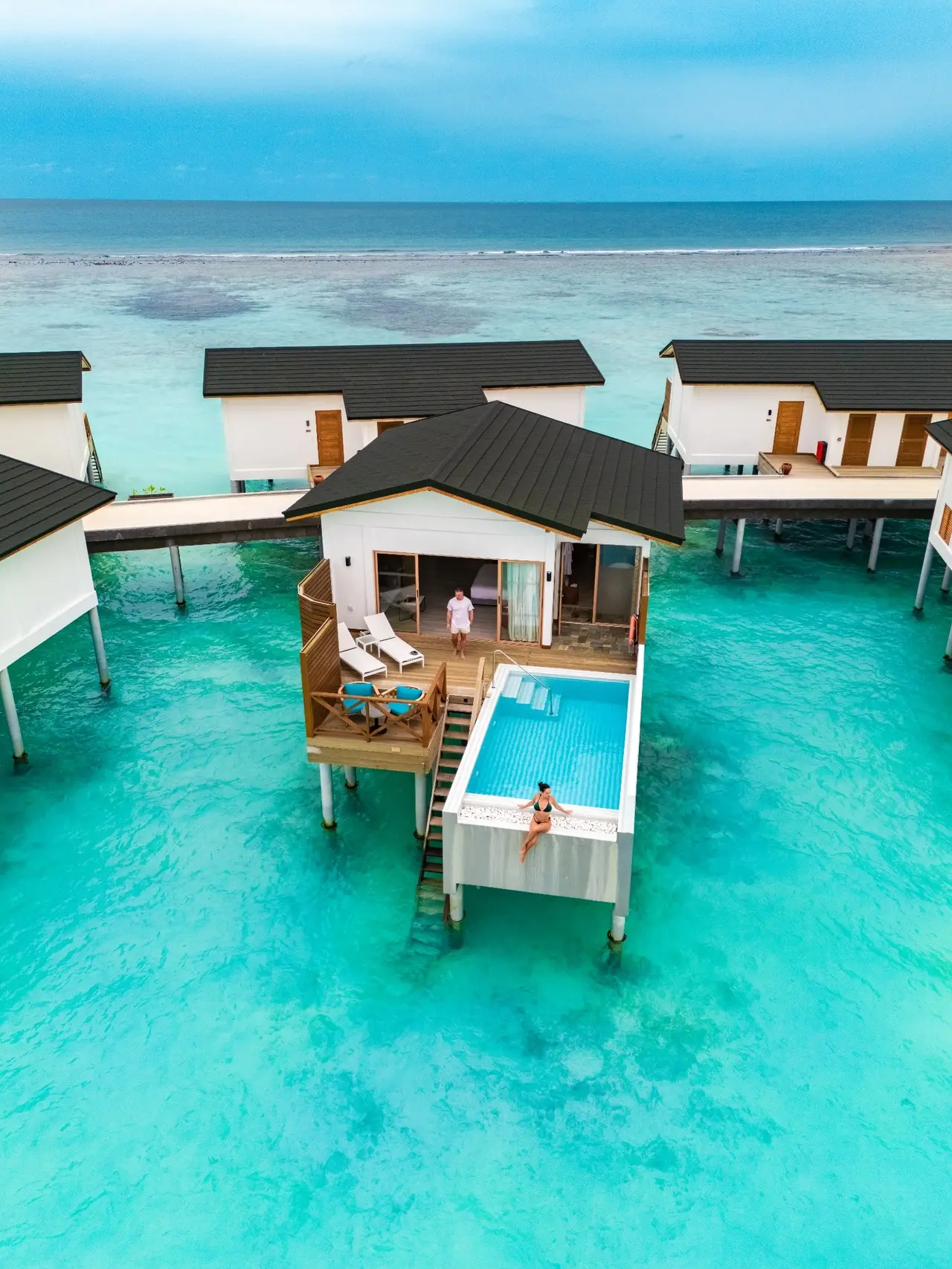 A Lagoon Suite Pool from above, its pool on the deck over the lagoon