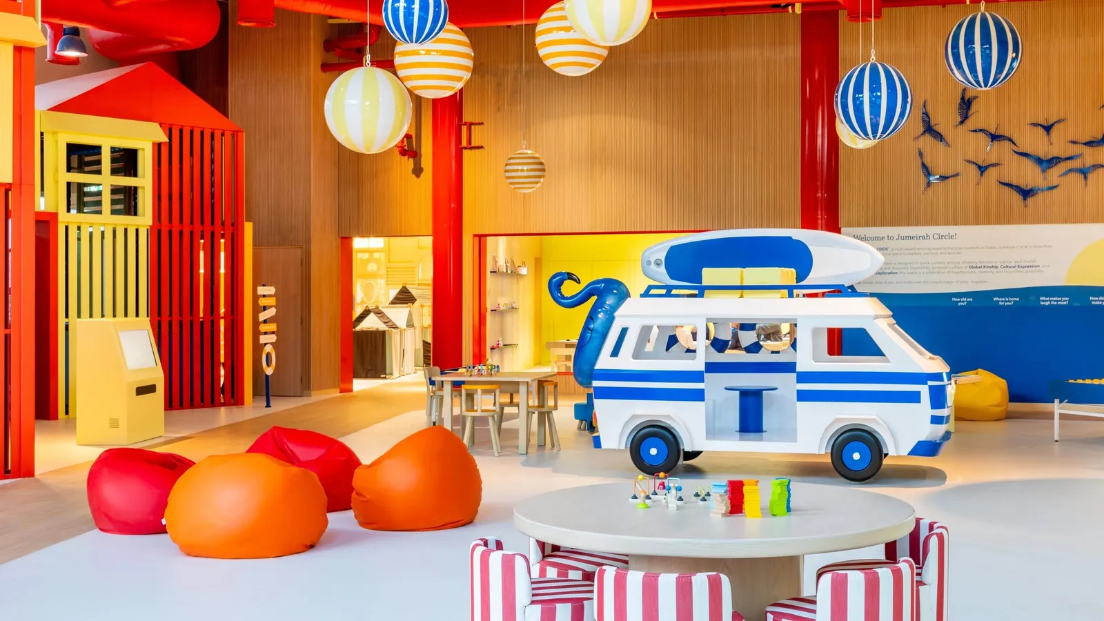 The colourful Jumeirah Circle room with a toy-brick camper van