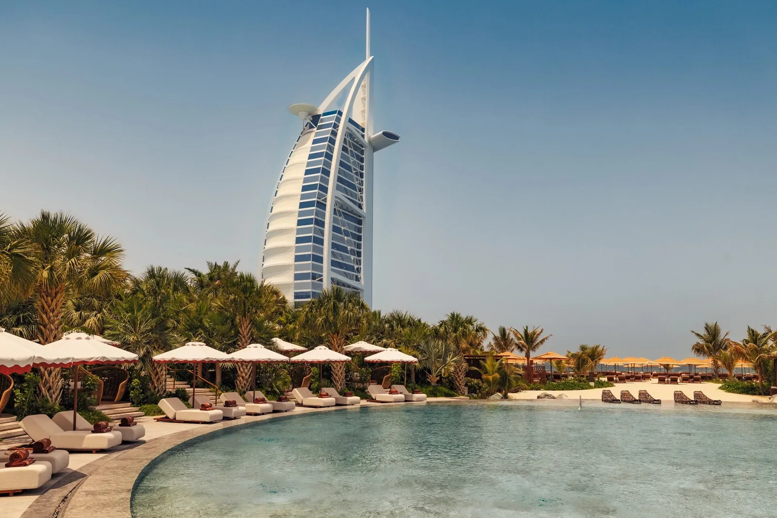 The resort pool with the Burj Al Arab beyond the palms