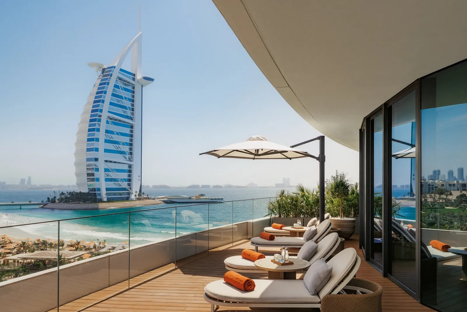 The spa terrace with loungers and the Burj Al Arab