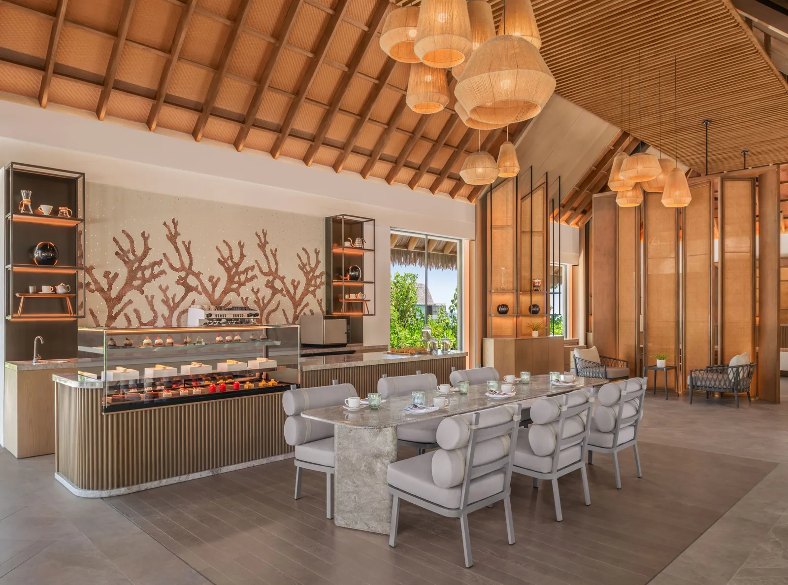 Tito’s pastry counter beneath the wooden ceiling