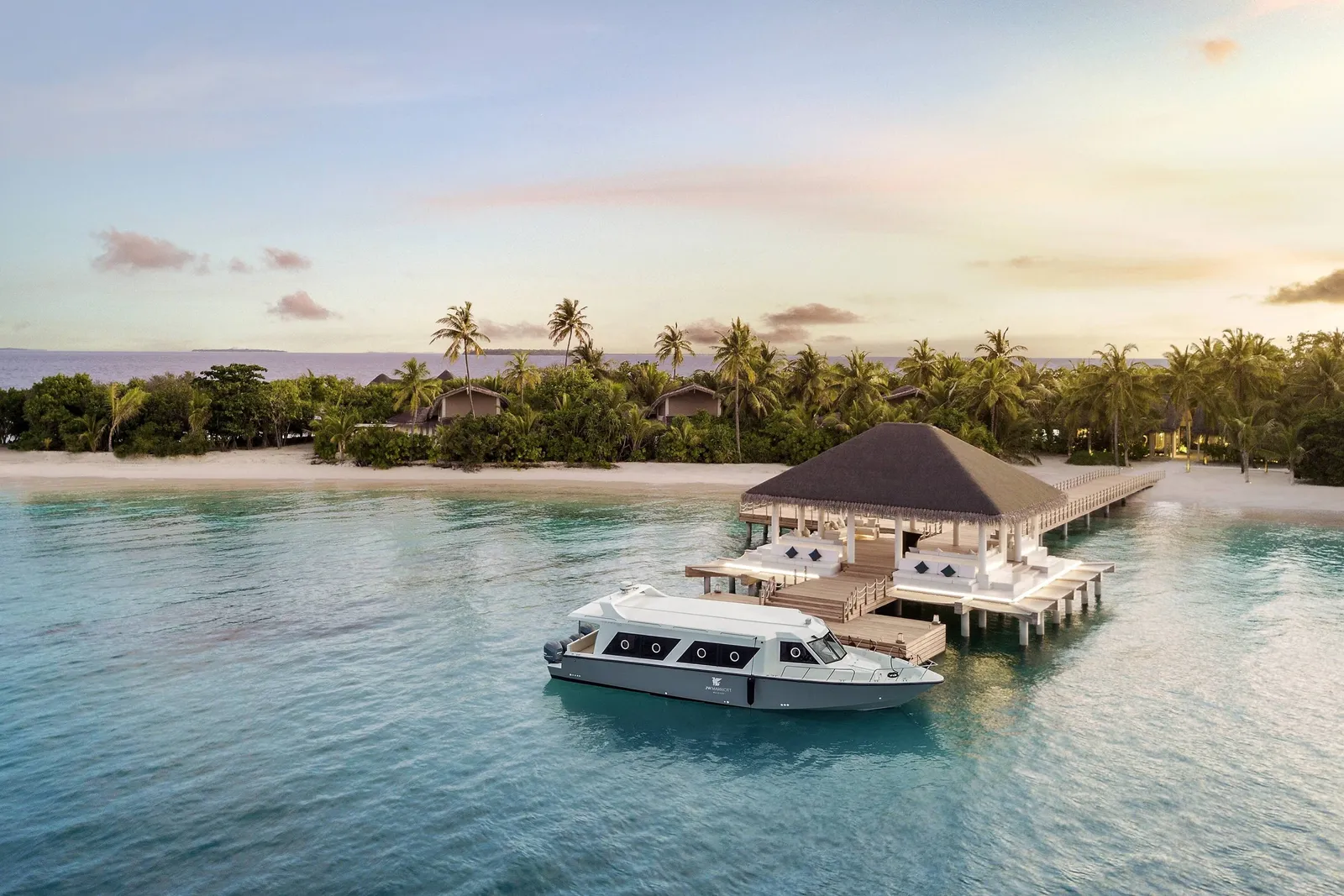The arrival pavilion on the jetty, a boat moored in front