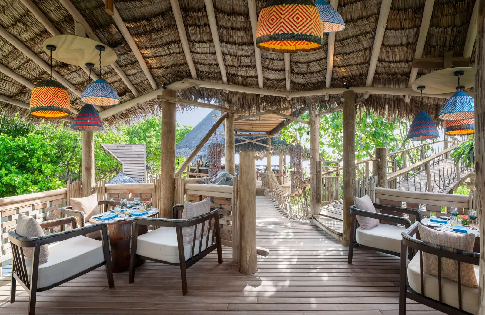Kaashi’s terrace in the trees, its lanterns and tables laid