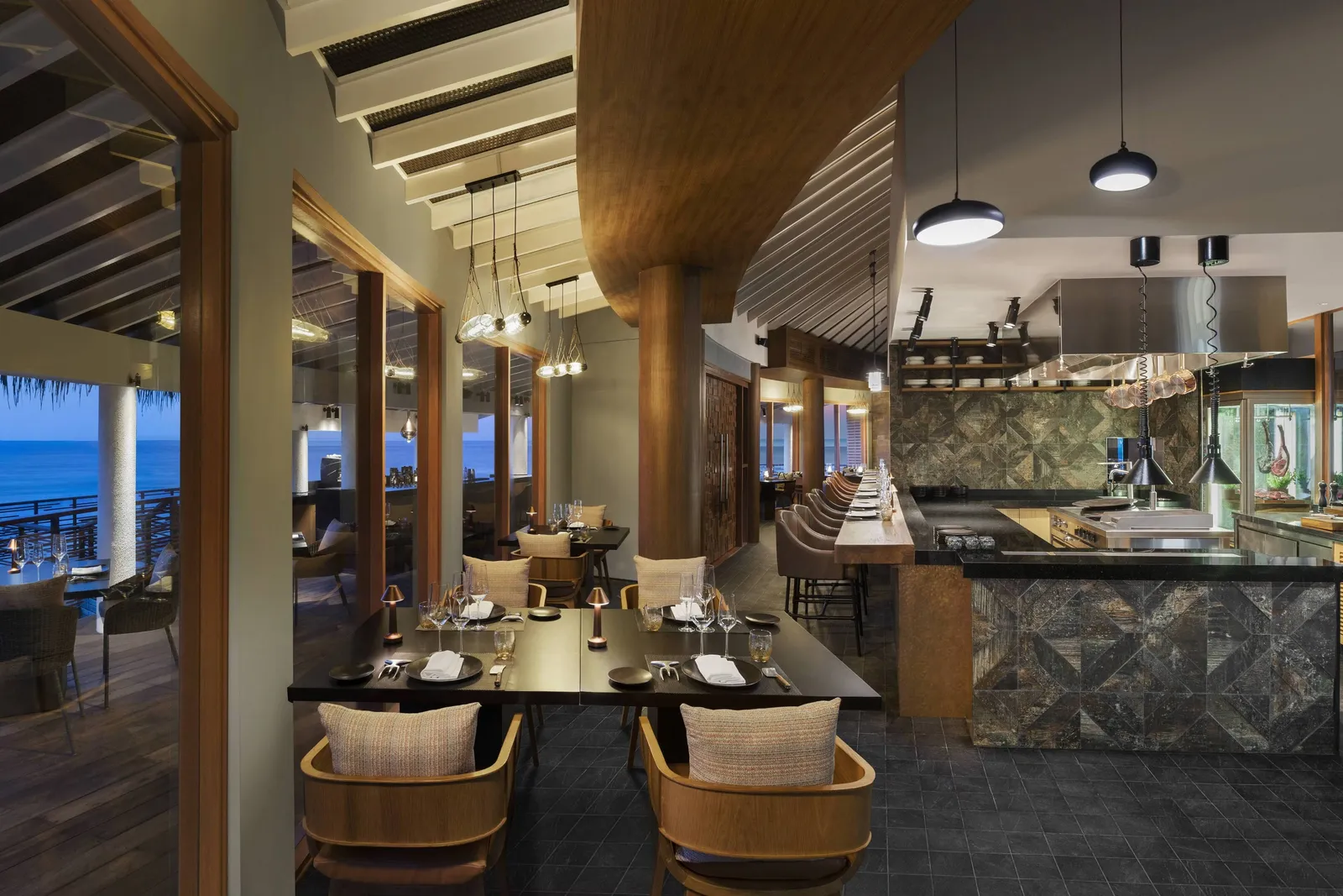 Shio’s dining room, the open grill at the back and the tables laid