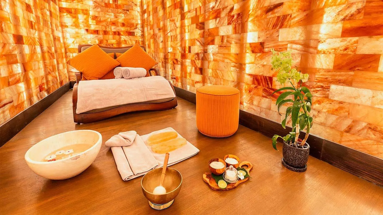 The Lonu Cave, the room lined with Himalayan salt, its treatment bed and bowls