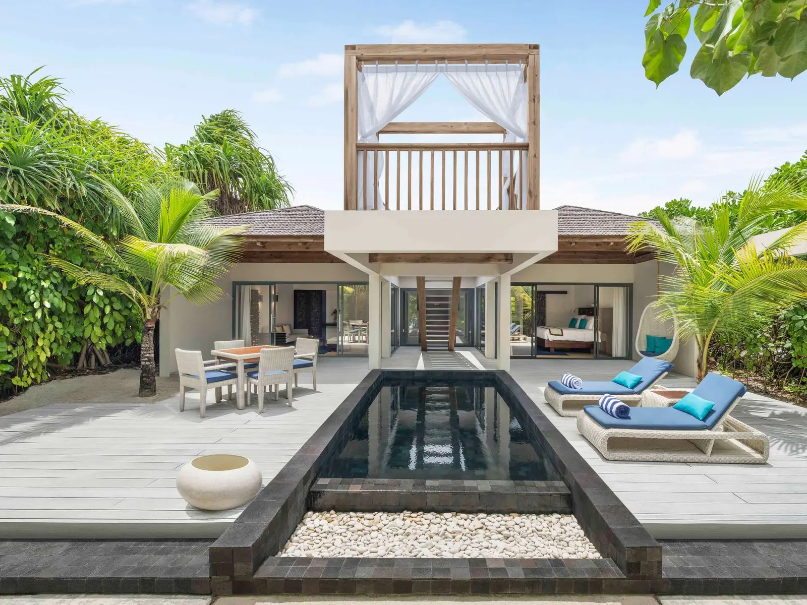 A Beach Pool Villa’s deck and pool, with its roof terrace