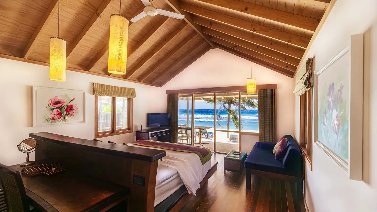 Beach Villa bedroom with a timber roof and sea view