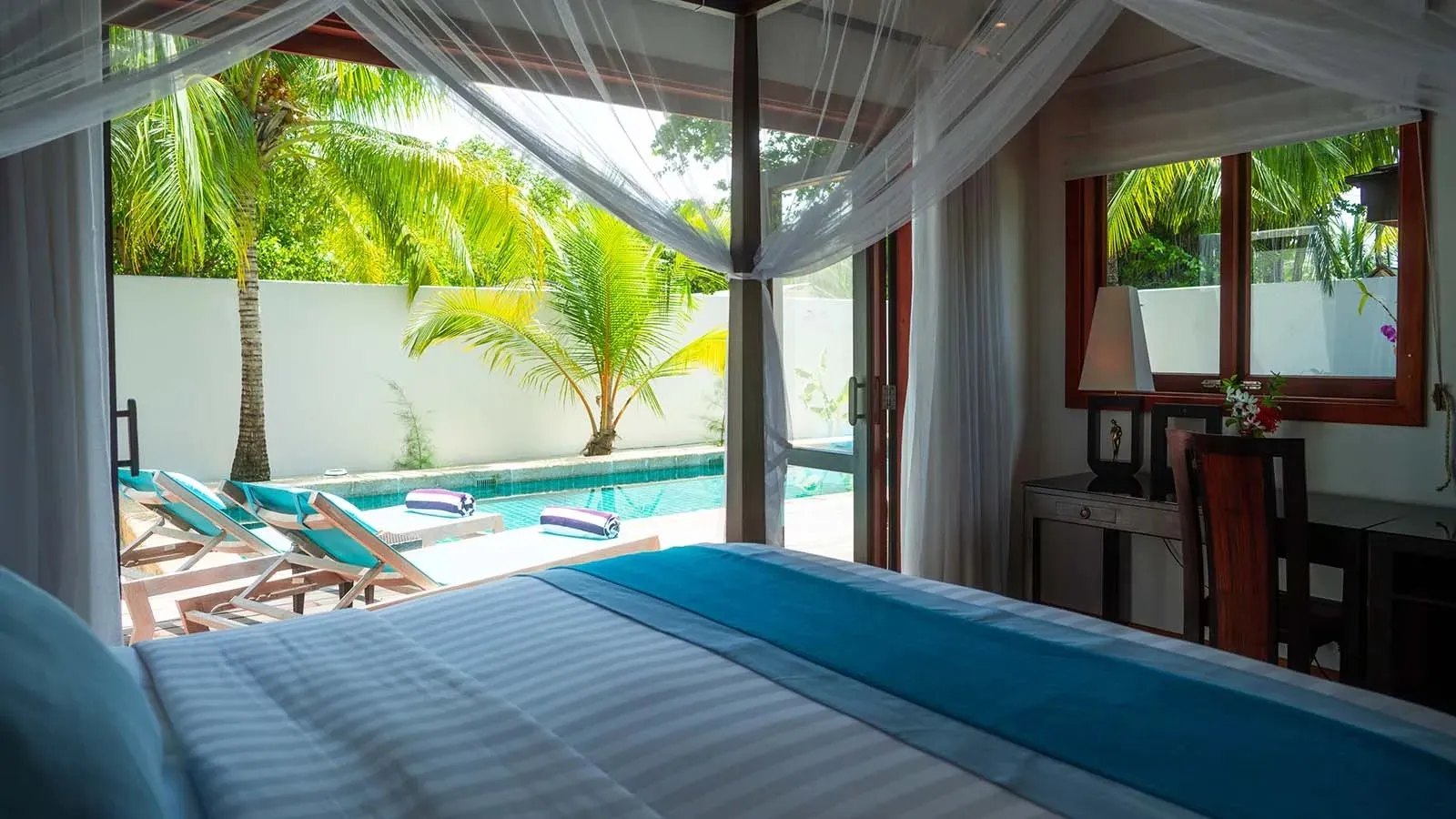Private Pool Villa pool and bedroom among palms