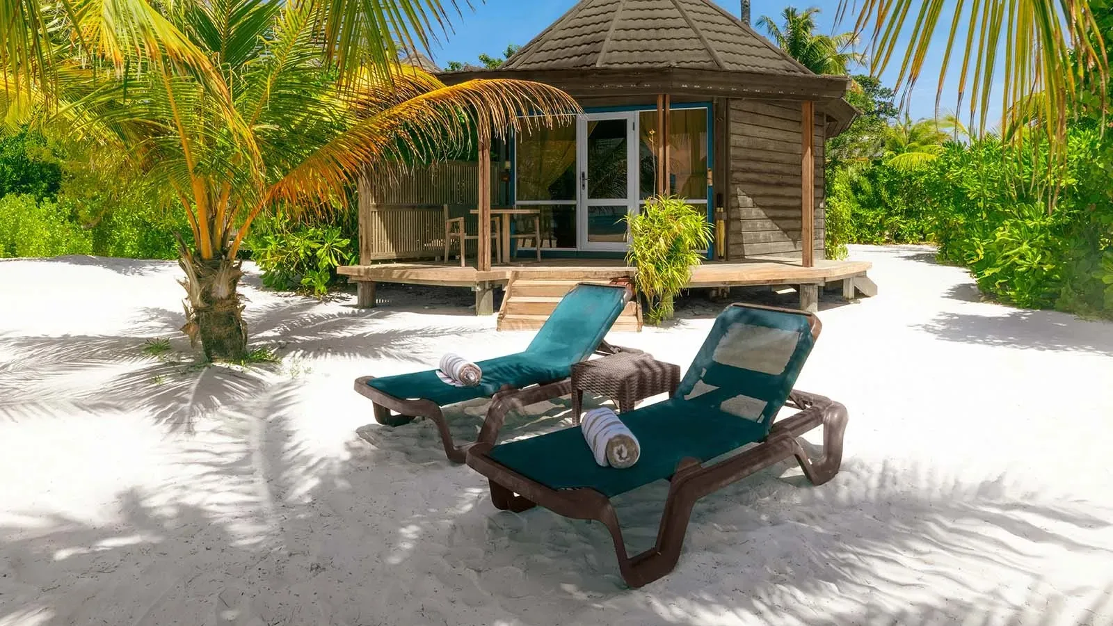 Sangu Premium Beach Villa with loungers in front of the veranda