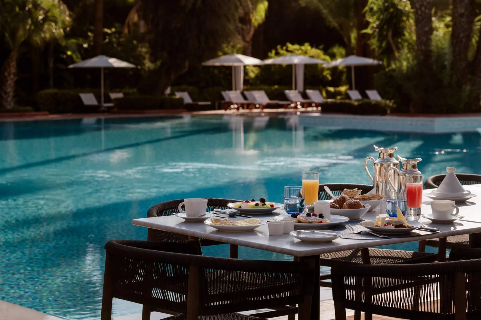 Breakfast tables beside the big pool