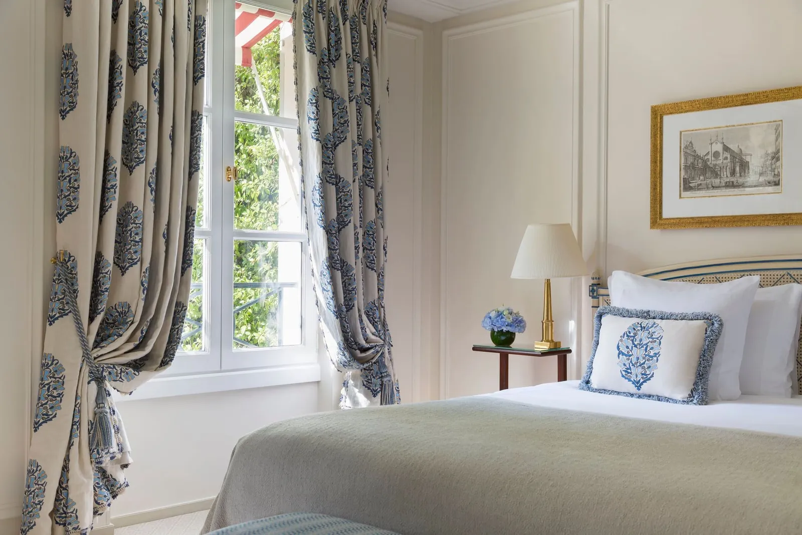 The interior of Junior Suite with garden view · Le Bristol Paris