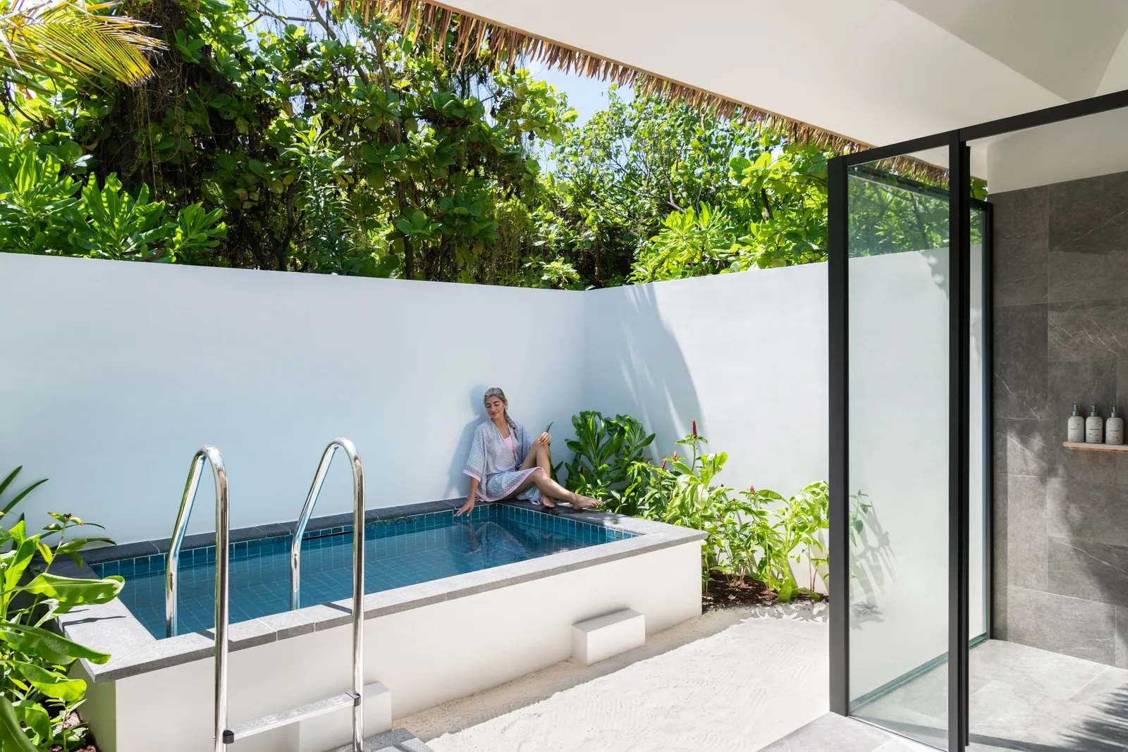 The pool in a Beach Garden Pool Villa’s walled garden