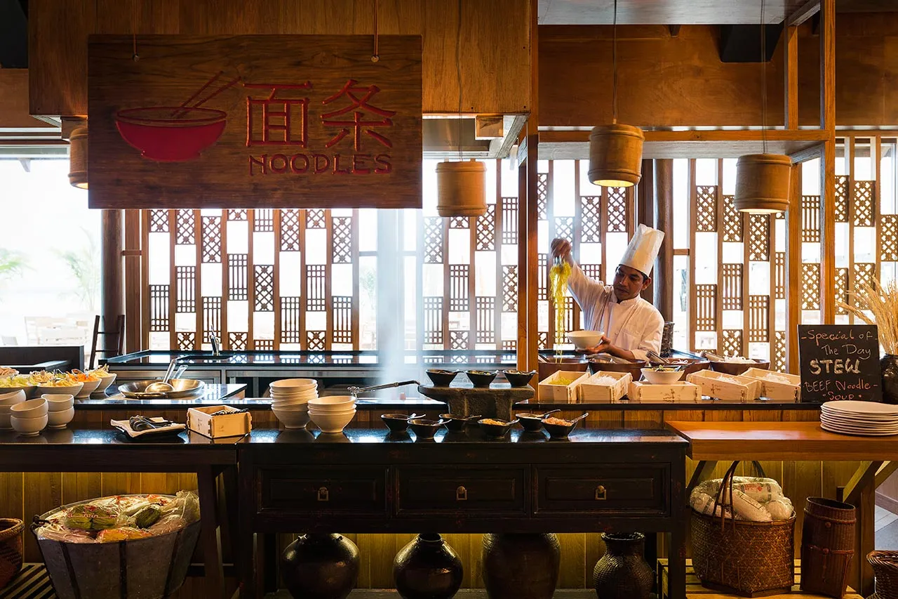 EAST Market’s dining room, its open kitchens and lanterns