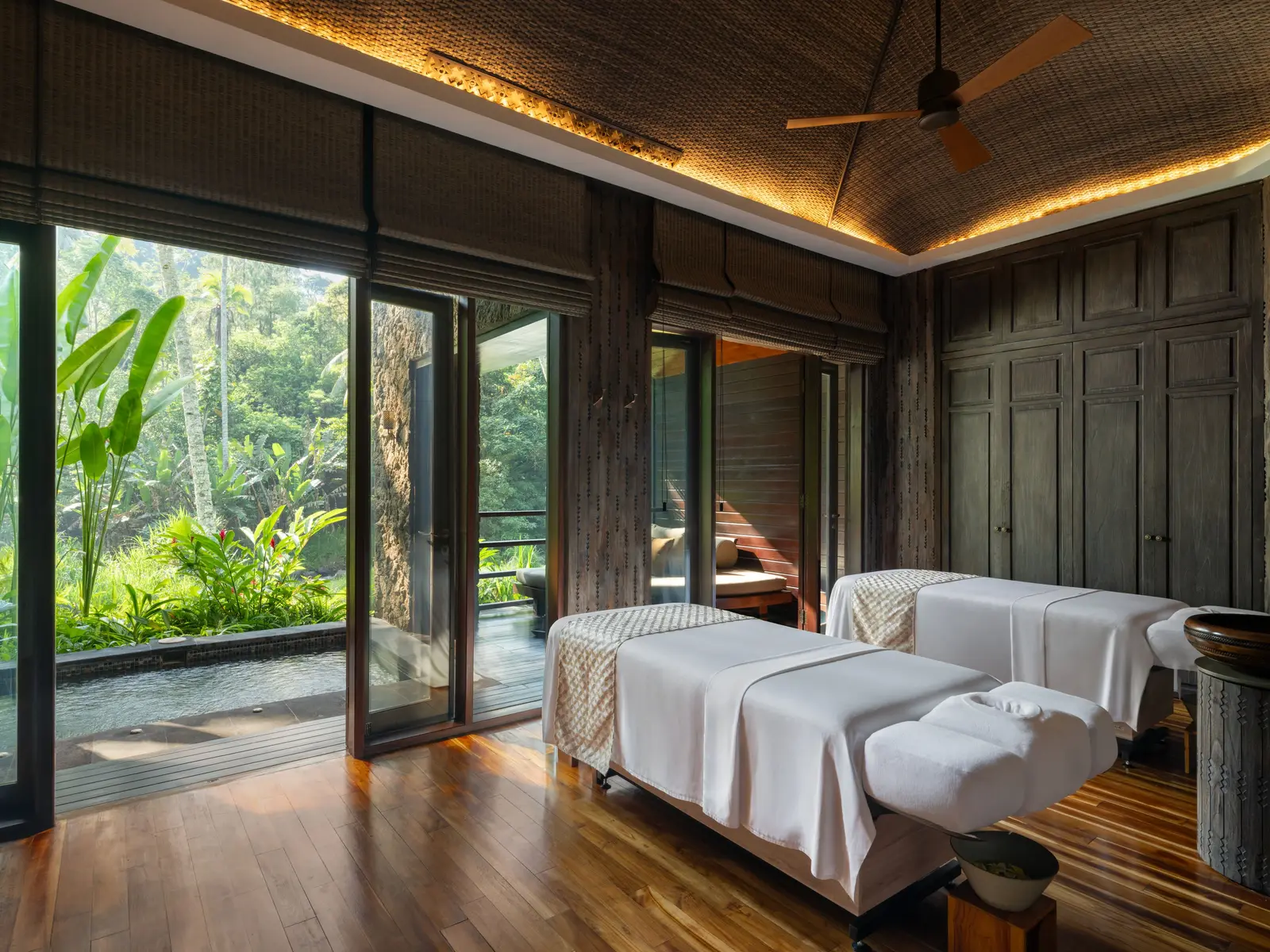 The spa’s room for 2, its glass walls on the garden