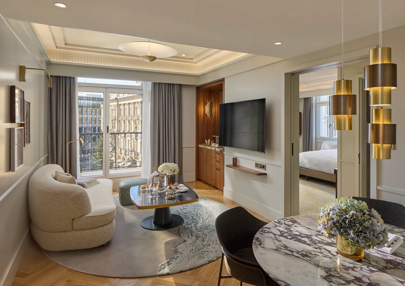 Sofa and round table in one of the connecting suites