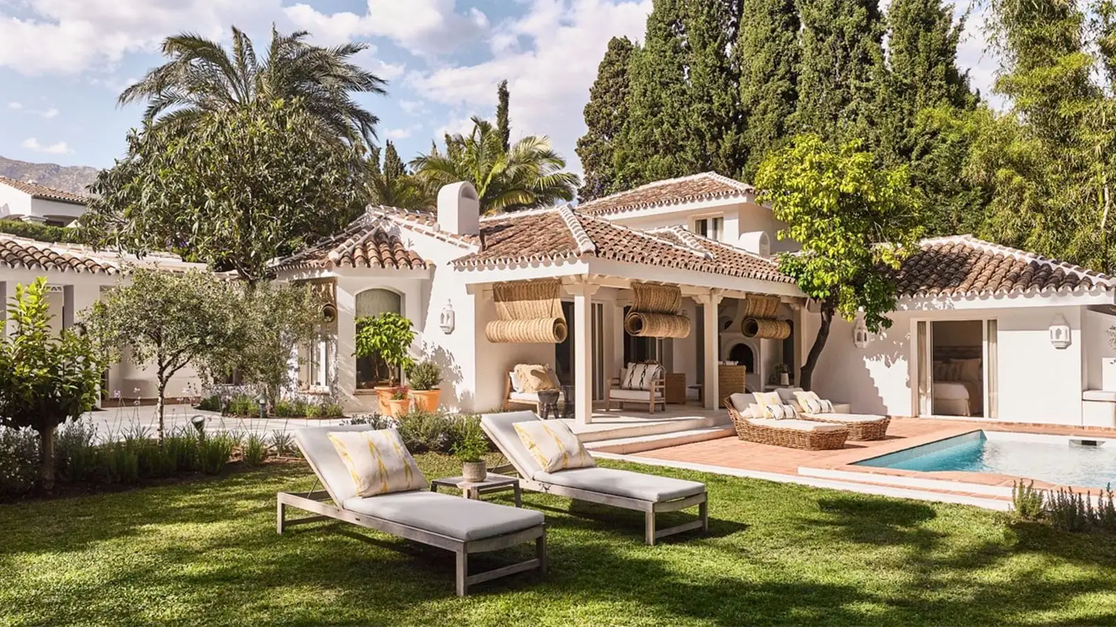 Pool, loungers and covered terrace at Casabel
