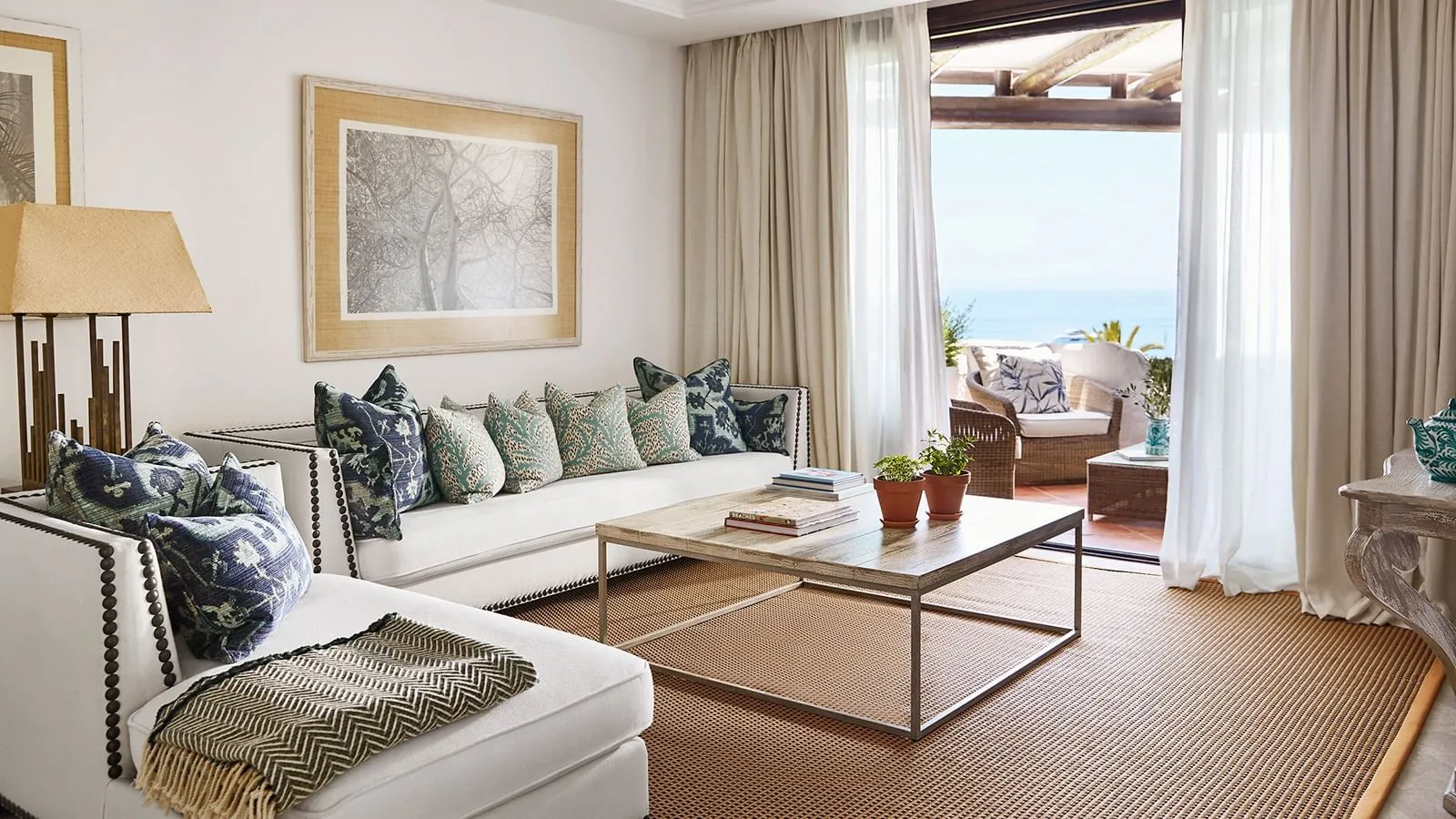 Royal Beach Suite sitting room with the sea beyond its terrace