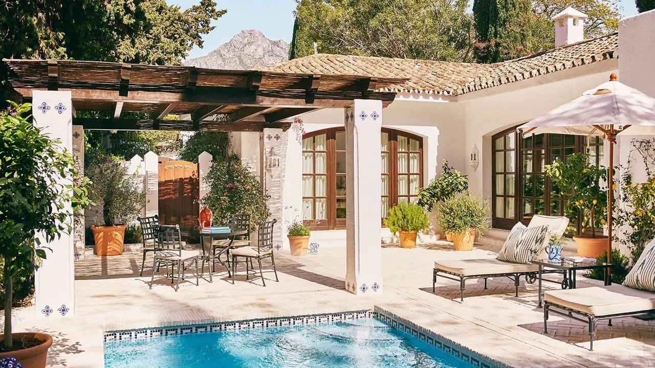 Pool and pergola at a 2-bedroom bungalow