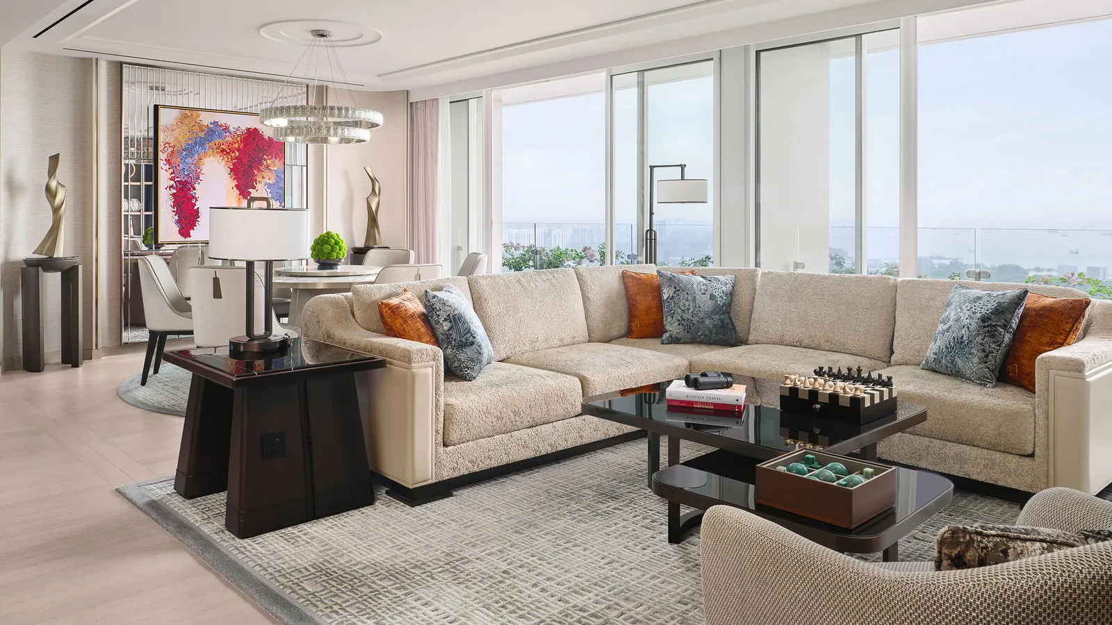 Paiza Grand Suite: the corner sofa, the dining area and the windows on the gardens and the sea.