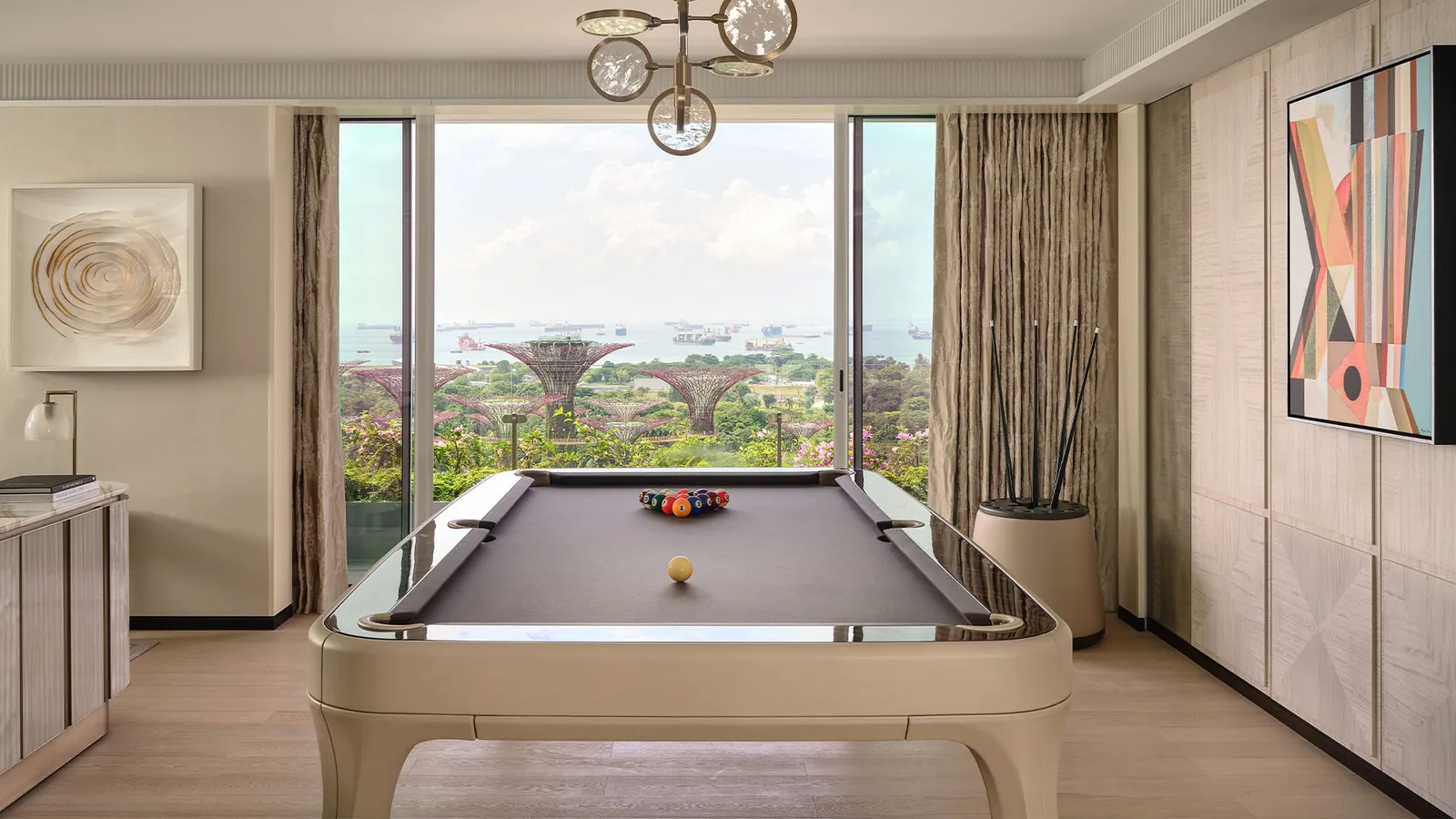 Sands Signature Suite: the pool table in front of the window on the Supertrees and the sea.