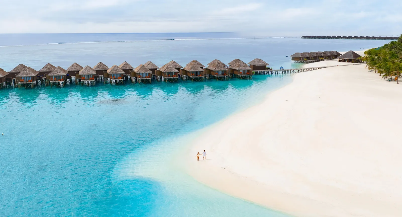 Meeru’s beach and overwater villas