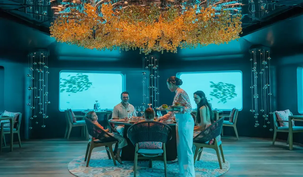 Bubble’s dining room with windows onto the water.