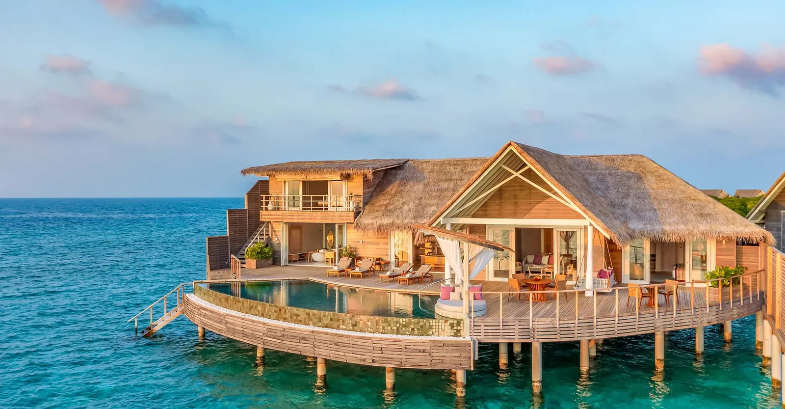 The Two-bedroom Ocean Residence at the end of the jetty, its pool curving round the deck