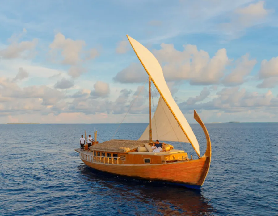 The dhoni Saima under sail on the blue sea