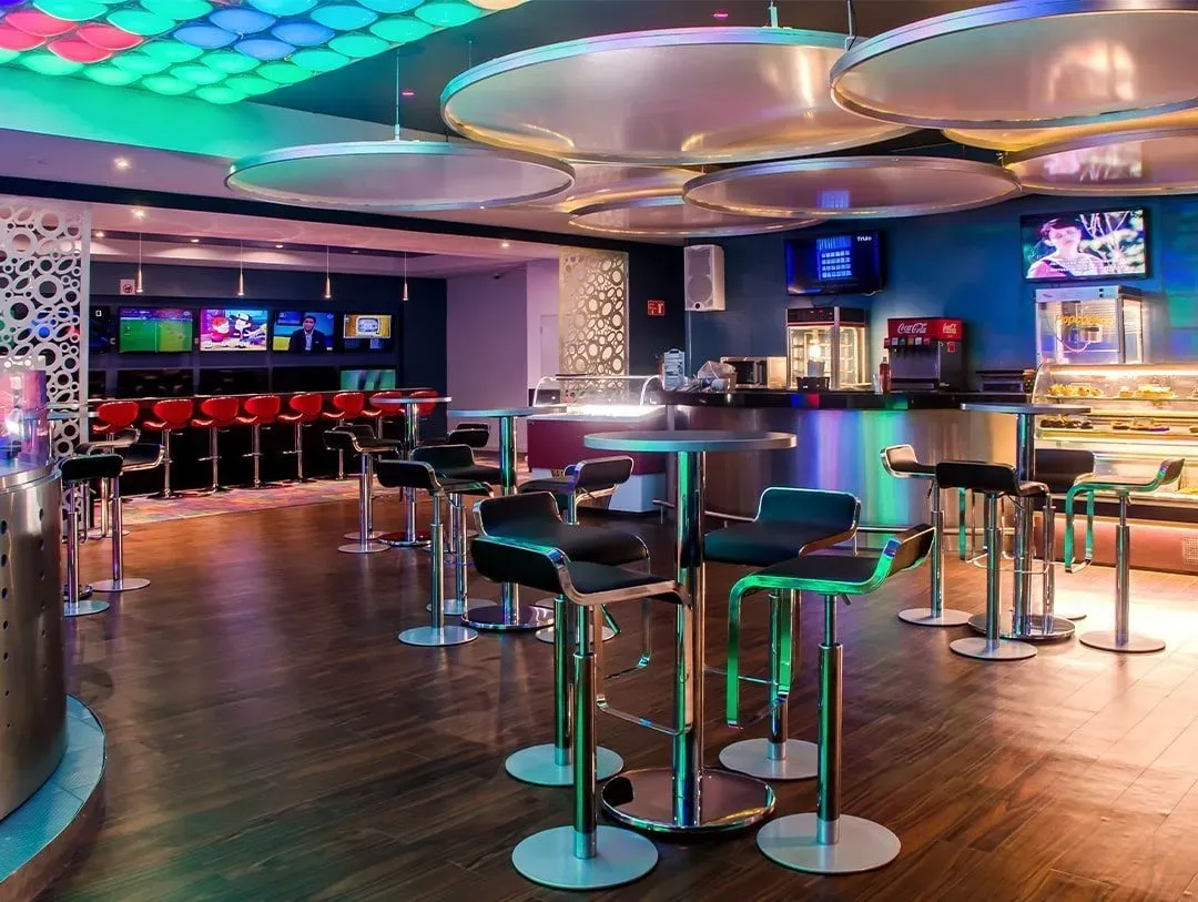 High tables and gaming stations in the Wired Lounge