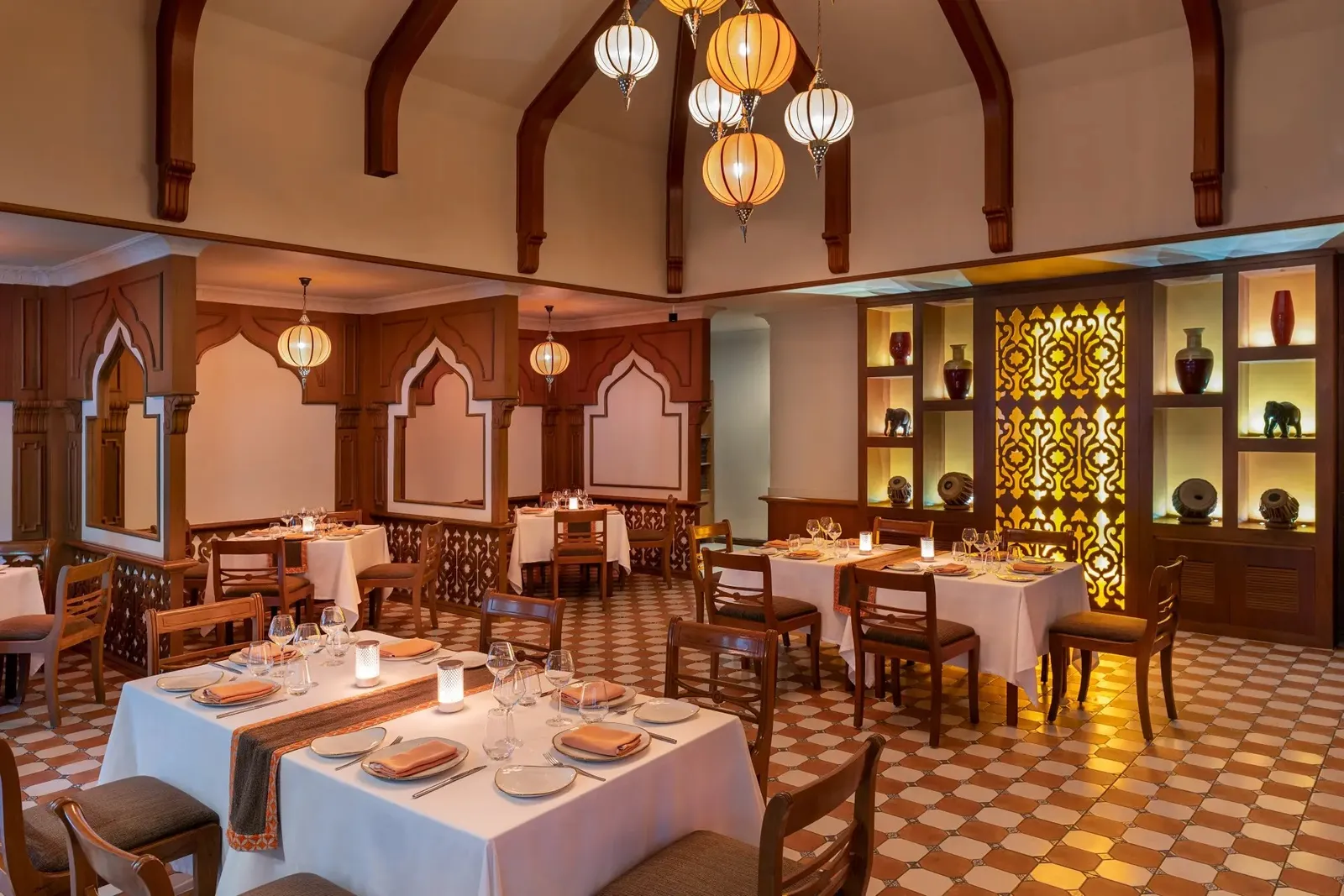 Mahal, the Indian restaurant, its lanterns and laid tables